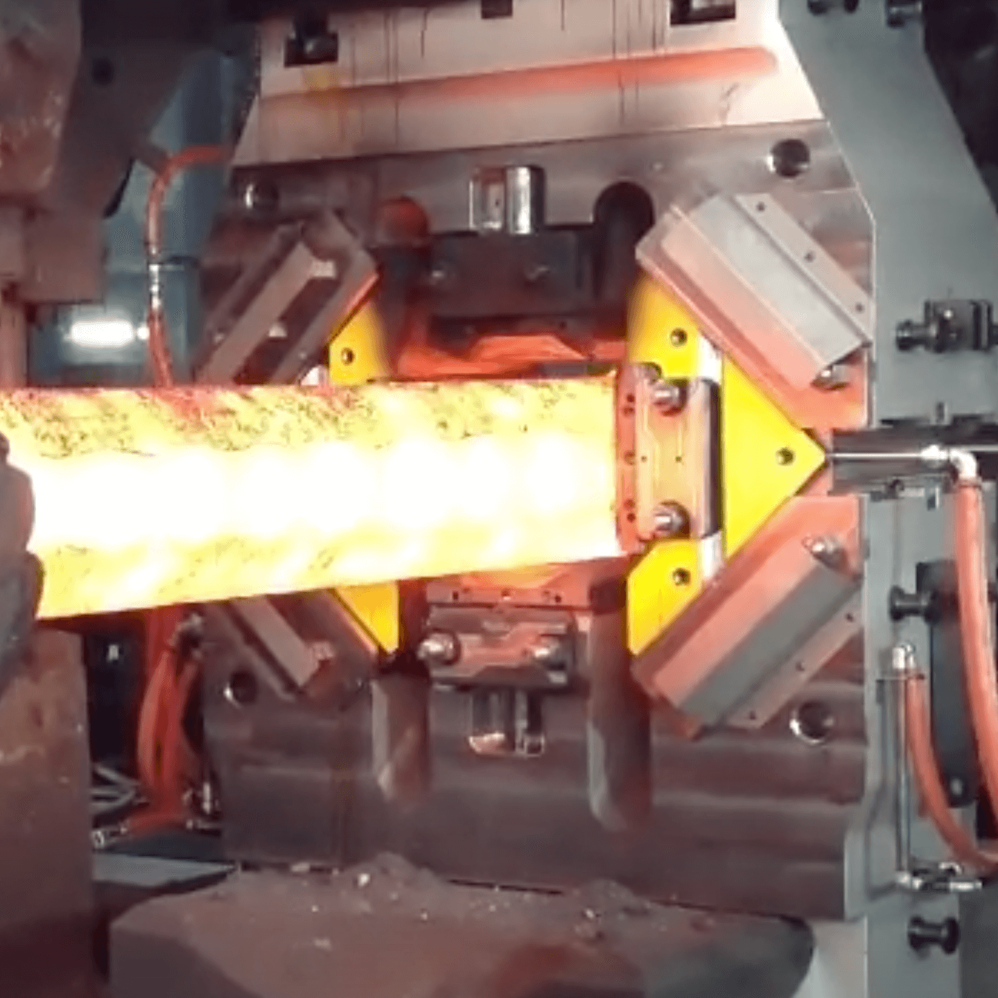 Four-die forging devices